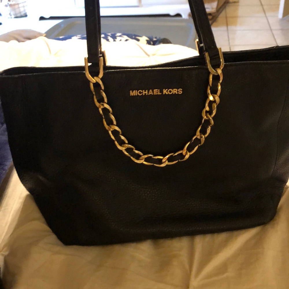 Michael Kors black leather bag with gold accents